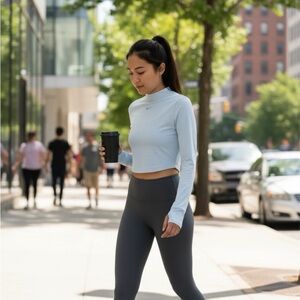 Nike Sky Blue Long Sleeve Crop Top